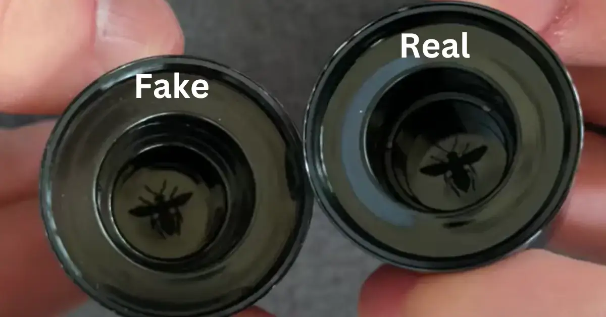 Bee logo inside the cap of real vs fake Dior Sauvage elixir is shown in the picture