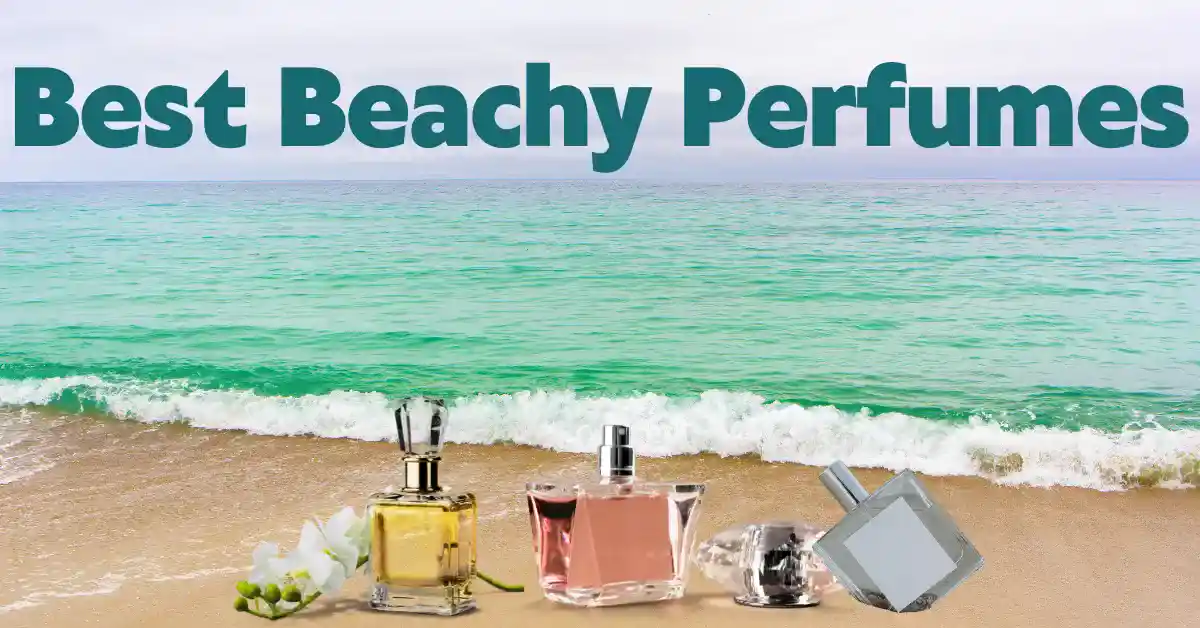 The featured image of the article beachy perfumes is shown. Where in the background is sea and some perfume bottles are on the sand